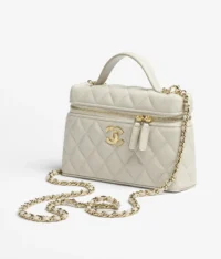 Chanel Small Vanity Case in cream quilted leather with gold CC logo and chain strap