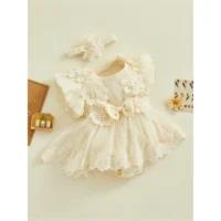 Baby girl cream lace dress set with floral appliqués, lace detailing, embroidered skirt overlay, and matching headband, displayed for catalog