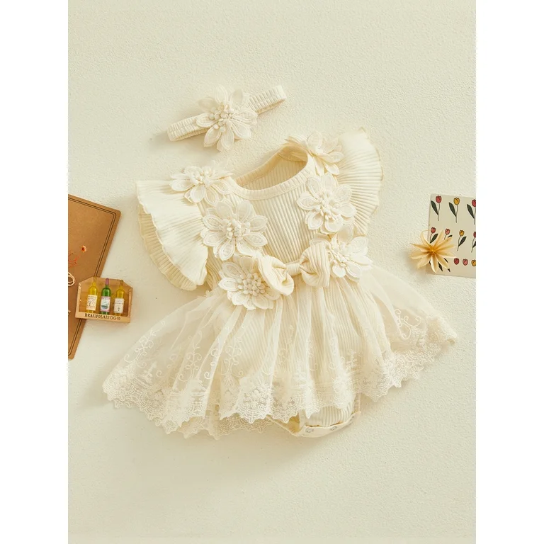 Baby girl cream lace dress set with floral appliqués, lace detailing, embroidered skirt overlay, and matching headband, displayed for catalog