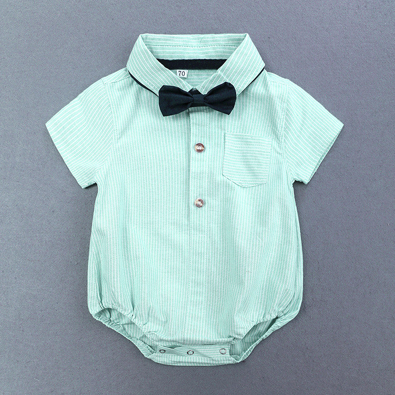 Baby boy mint green formal outfit set with bow tie, suspenders, navy shorts, and matching cap, displayed for catalog.