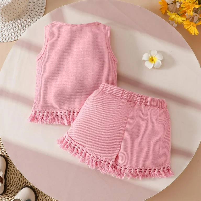 Girls summer outfit set with sleeveless top and matching shorts, displayed for catalog