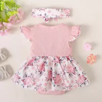 Baby girl floral dress set featuring ribbed bodice, waist bow, floral skirt, and matching headband. Perfect for birthdays, photoshoots, and special occasions