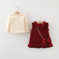 Baby girl red velvet dress set with Peter Pan collar, ruffled trim, decorative buttons, and cream long‑sleeve top, displayed for catalog.