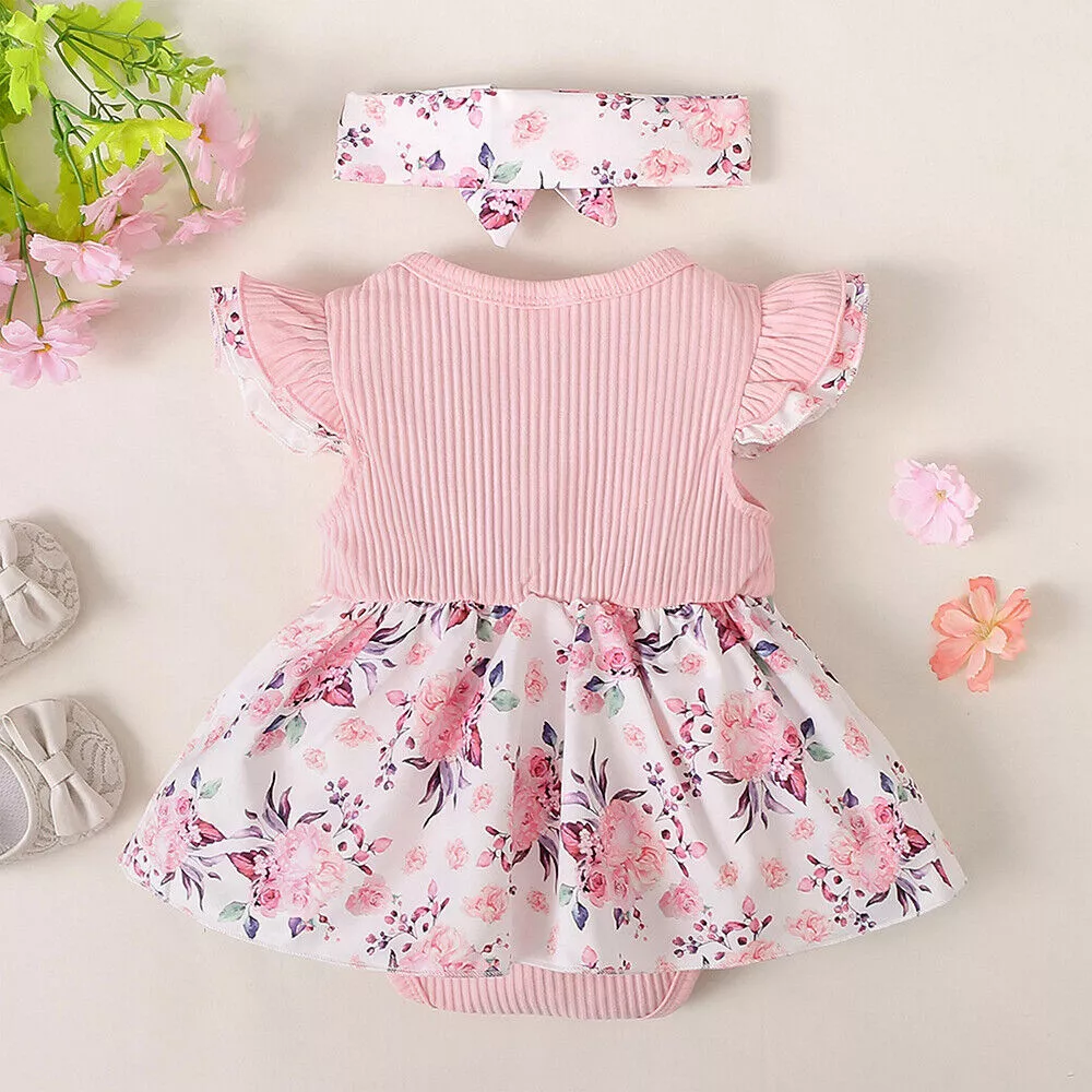Baby girl floral dress set featuring ribbed bodice, waist bow, floral skirt, and matching headband. Perfect for birthdays, photoshoots, and special occasions