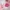 Girls white dress and pink knitted vest set with embroidery, floral appliqués, tiered skirt, and matching accessories, displayed for catalog