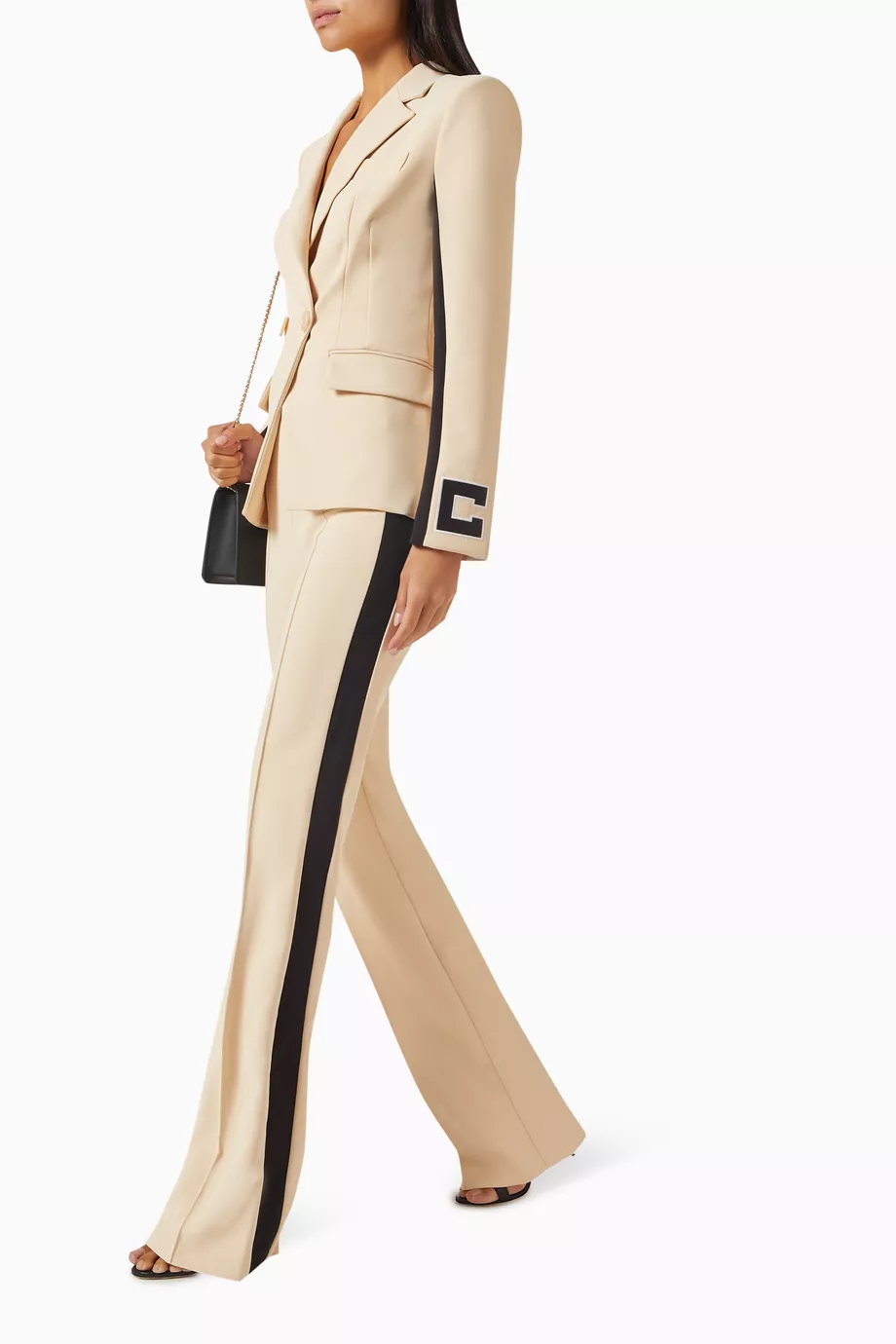 Neutral Luxury Tailored Blazer & Flare Trousers Suit Set Premium imported black women's suit with cream side stripes and flare trousers — Curated luxury fashion on Tsapa Rwanda.