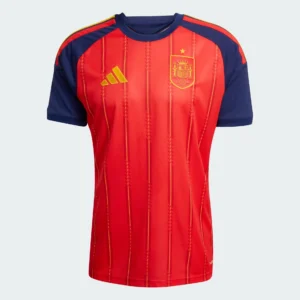 Official 2026 Spain national football team home jersey in red with blue sleeves and yellow details, displayed as an e-commerce product/ shop on tsapa