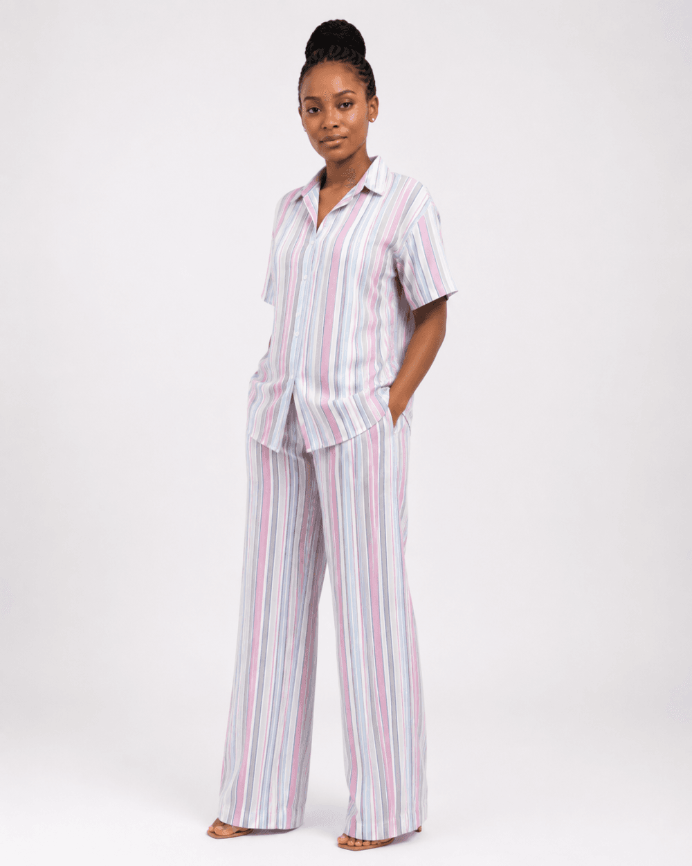 7e8e1499-132b-456c-ab81-eb9b5a891749 Women’s Pastel Striped Shirt and Wide-Leg Trouser Set