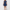 Woman wearing a dark blue short-sleeve fit-and-flare denim shirt dress