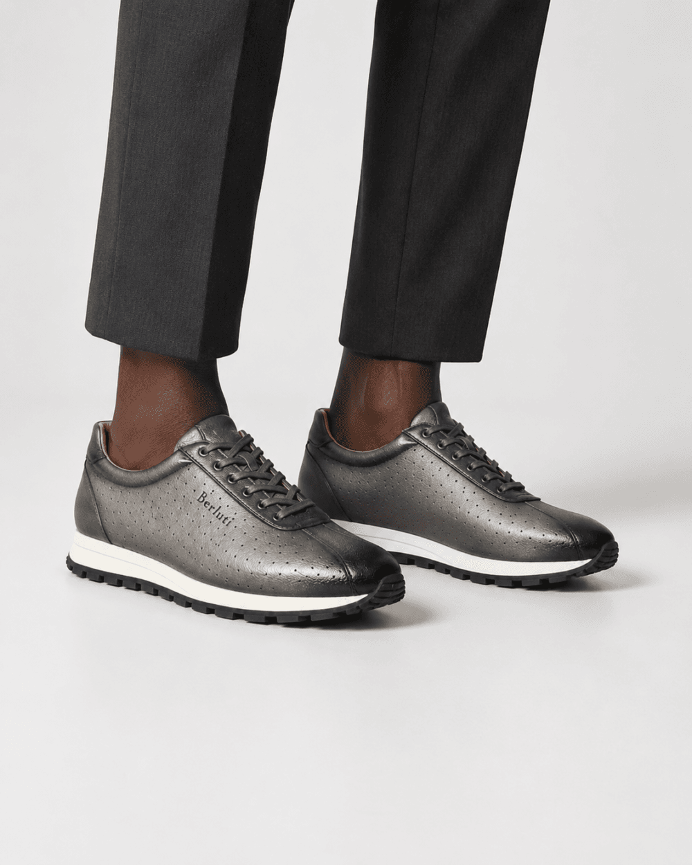 a aman in Berluti grey perforated leather lug-sole sneakers for men