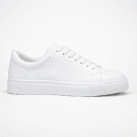 Lateral profile view of a white Zara men's minimalist low-top court sneaker in smooth leather with matching white laces and a thick rubber sole — Casual Men's Designer Footwear Rwanda.
