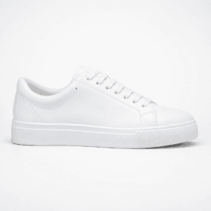 Lateral profile view of a white Zara men's minimalist low-top court sneaker in smooth leather with matching white laces and a thick rubber sole — Casual Men's Designer Footwear Rwanda.