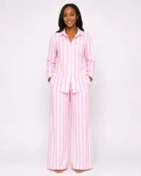 Woman wearing a pink and white striped long-sleeve shirt and wide-leg trouser set