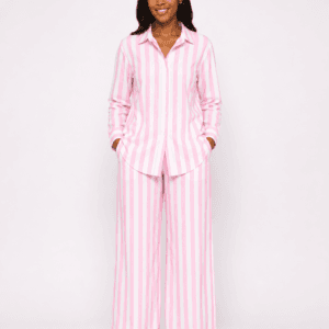 Woman wearing a pink and white striped long-sleeve shirt and wide-leg trouser set