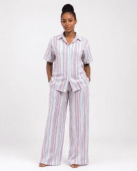 Women’s Pastel Striped Shirt and Wide-Leg Trouser Set Image caption Woman wearing a pastel vertical-striped shirt and wide-leg trouser two-piece set