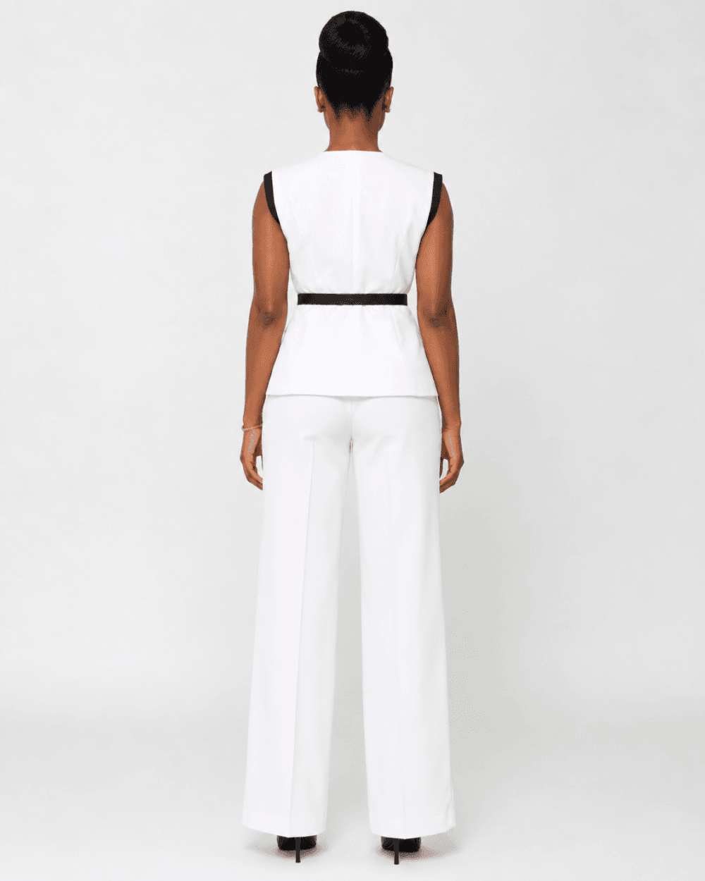 ec19bf50-07dd-402a-a5f1-21387d9c69df White Sleeveless Peplum Vest and Wide-Leg Trouser Set