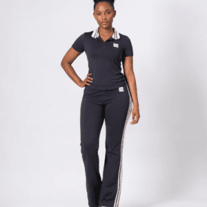 Full-length front view of model wearing camel black short-sleeve polo shirt and side-stripe track pants two-piece set — Women's Fashion Rwanda.