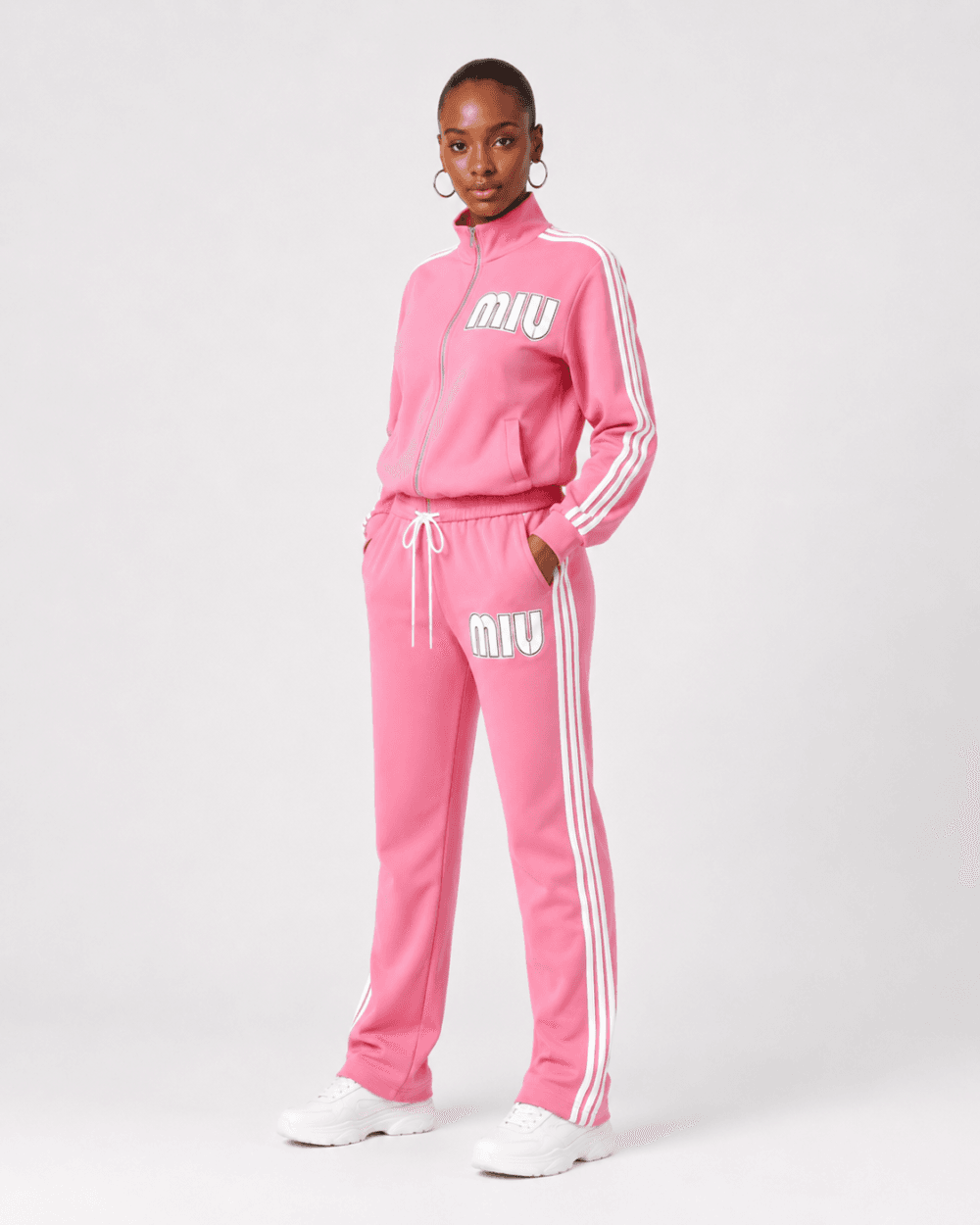 4ece78a6-0134-49a2-8c22-b0f52a1830fa Women's Pink Two-Piece Tracksuit Set | Zip-Up Jacket & Track Pants
