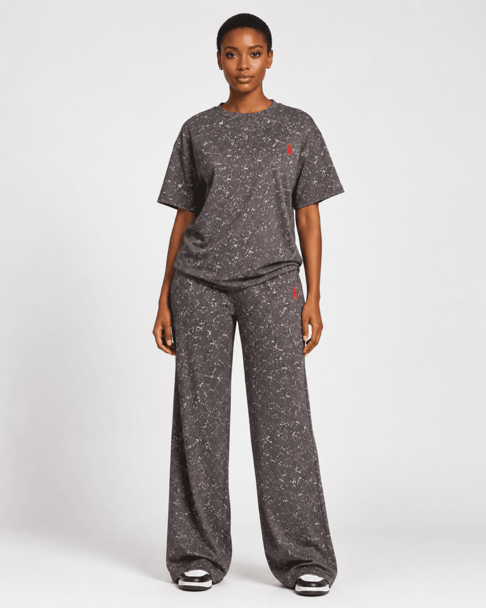 f7c00991-c31d-4729-bbbc-00c2d85959cb Full-length front view of model wearing charcoal grey acid wash oversized t-shirt and wide-leg sweatpants two-piece set with red logo — Women's Fashion Rwanda.